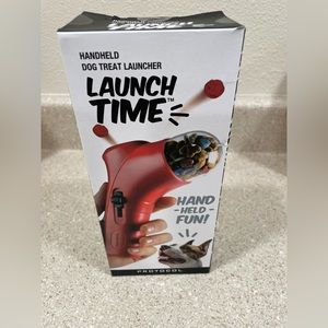 Launch time handheld Dog Treat Launcher